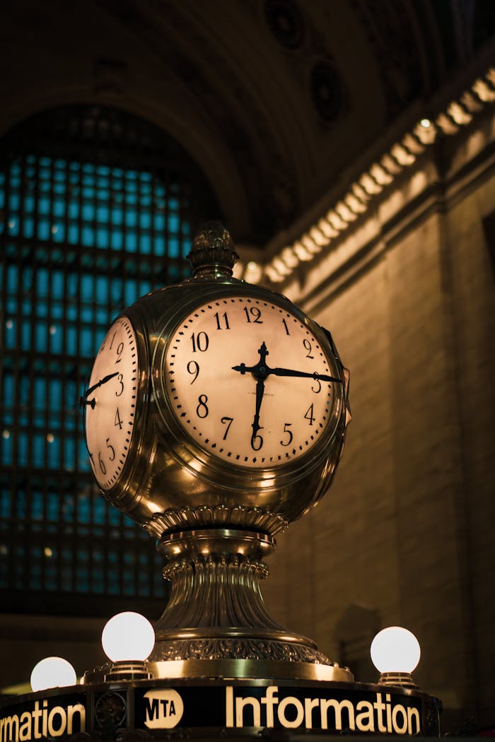 Capture of the classic clock at Grand Central Terminal, New York City, beautifully illuminated at night.